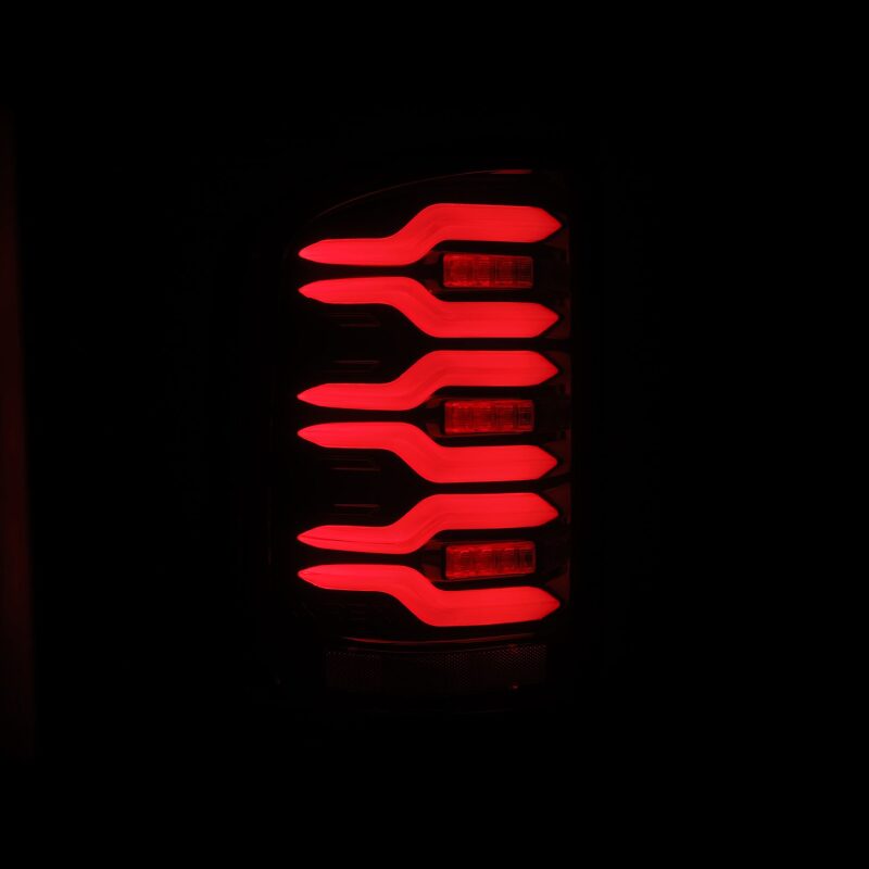 AlphaRex 14-18 GMC Sierra 1500/2500HD/3500HD LUXX-Series LED Tail Lights Blk/Red w/Actv Lgt Seq. Sig