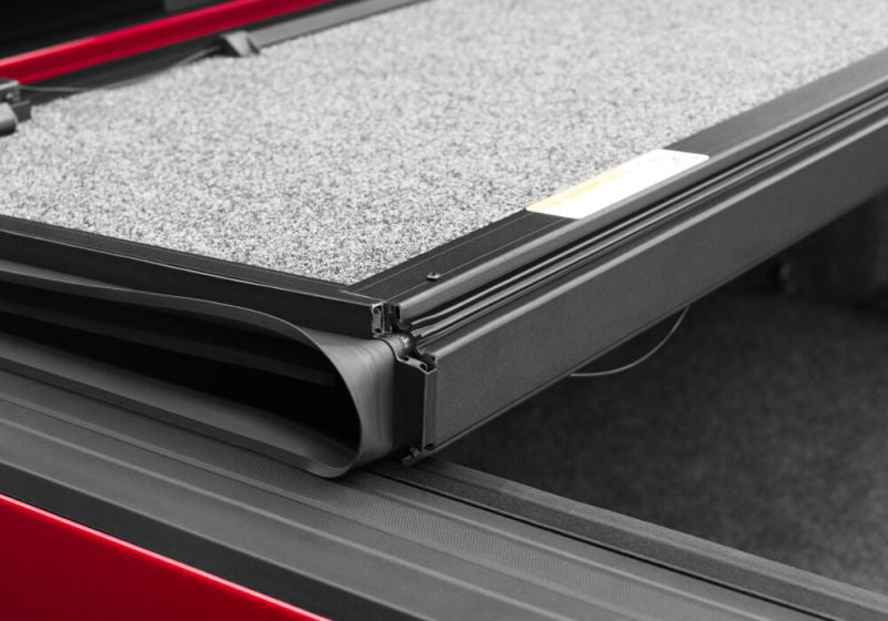 UnderCover 2023 Chevrolet Colorado / GMC Canyon 5.2ft Short Bed Ultra Flex Bed Cover - Black Texture